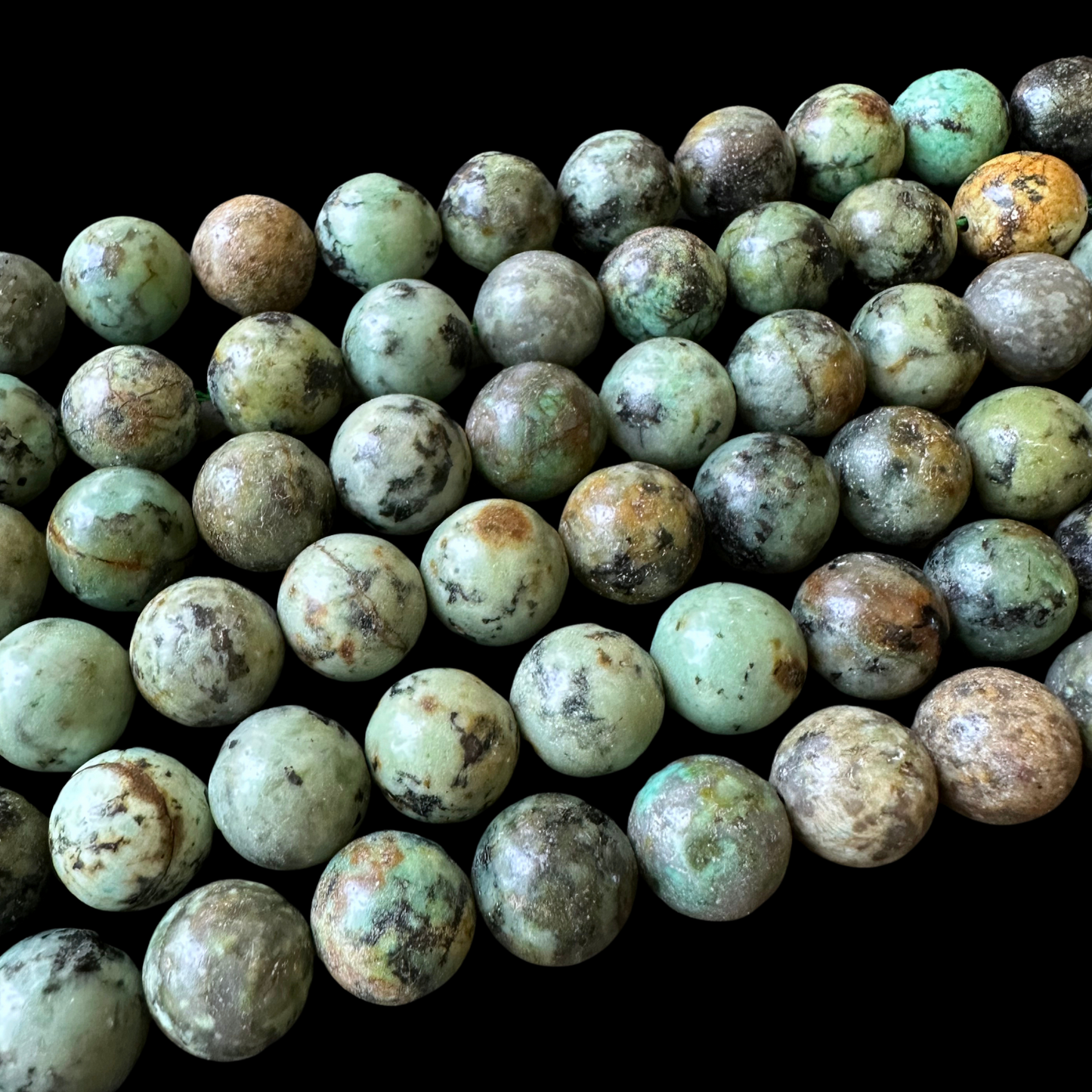 10mm african turquoise beads (undyed) - round - smooth - 15" strand - approx. 35 beads