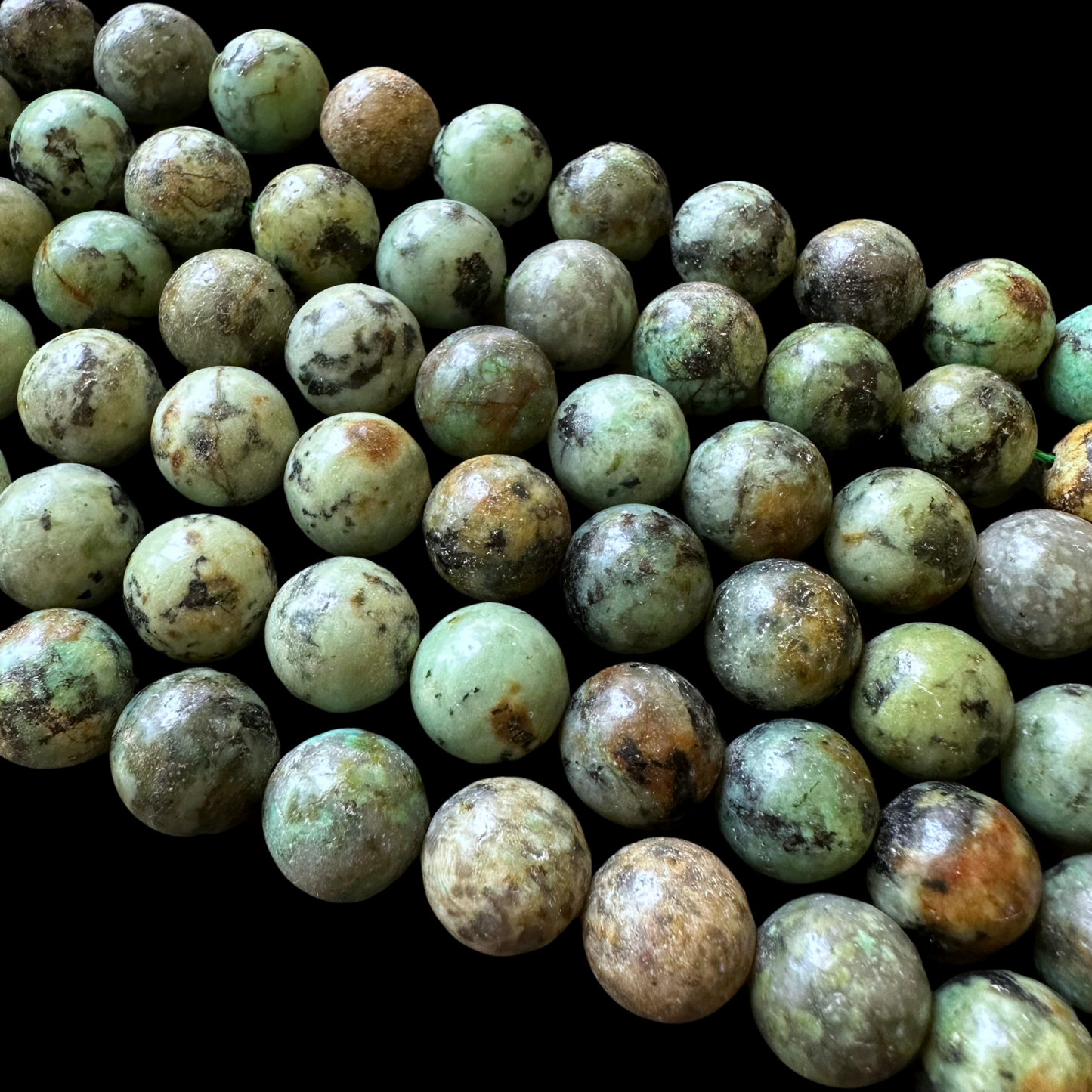 10mm african turquoise beads (undyed) - round - smooth - 15" strand - approx. 35 beads
