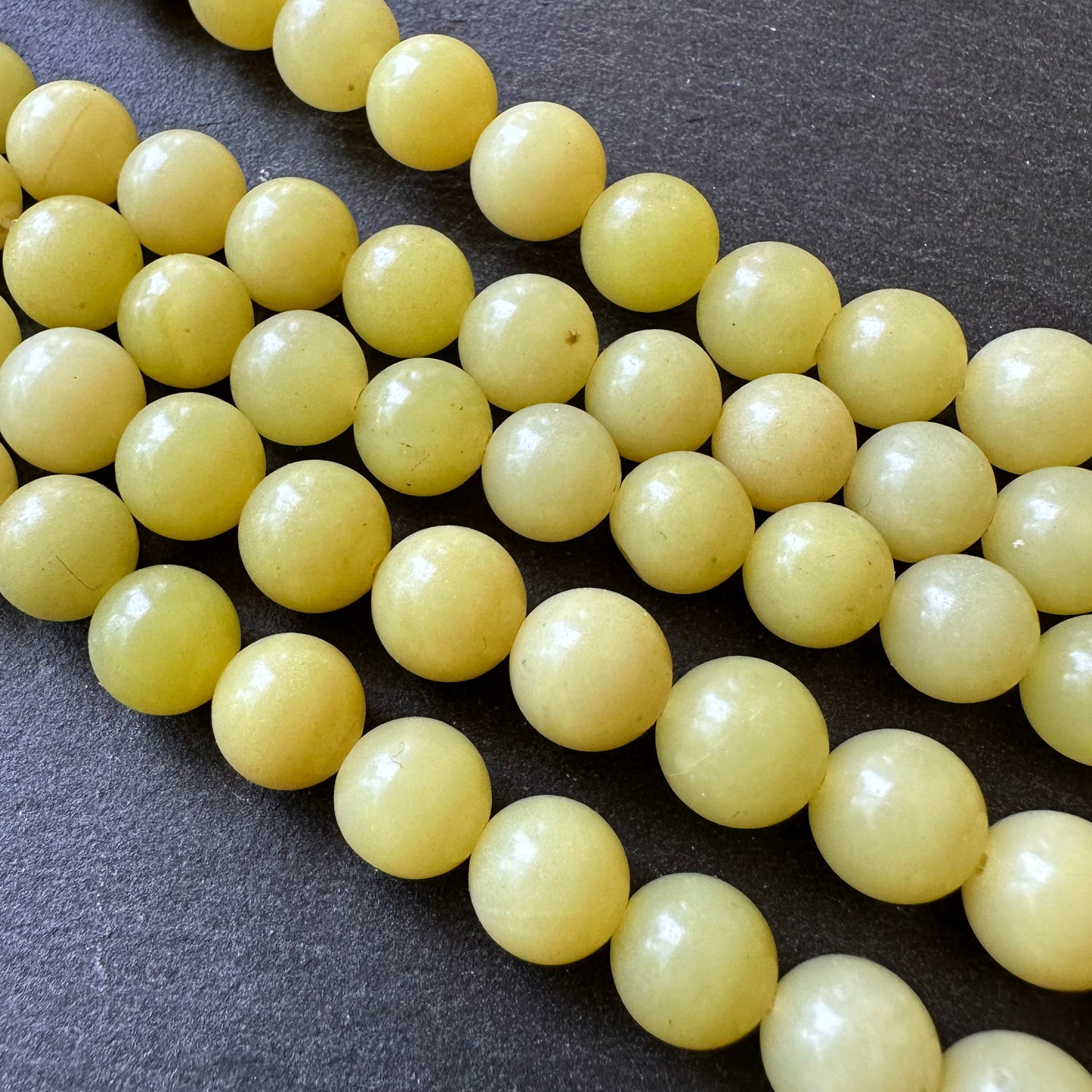 10mm lemon jade beads (undyed)- round - smooth - 15" strand - approx. 35 beads