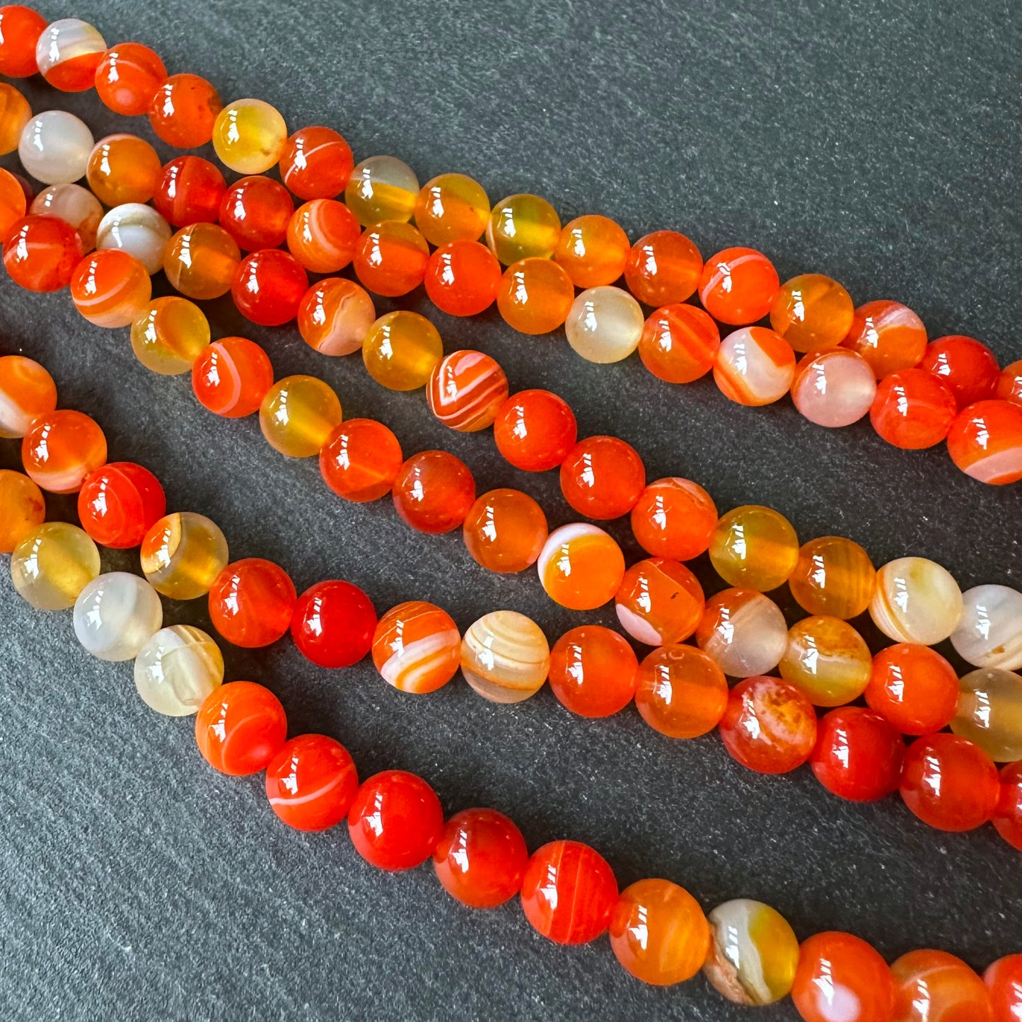 6mm orange striped agate beads - round - smooth - 15" strand - approx. 60 beads ST1-14