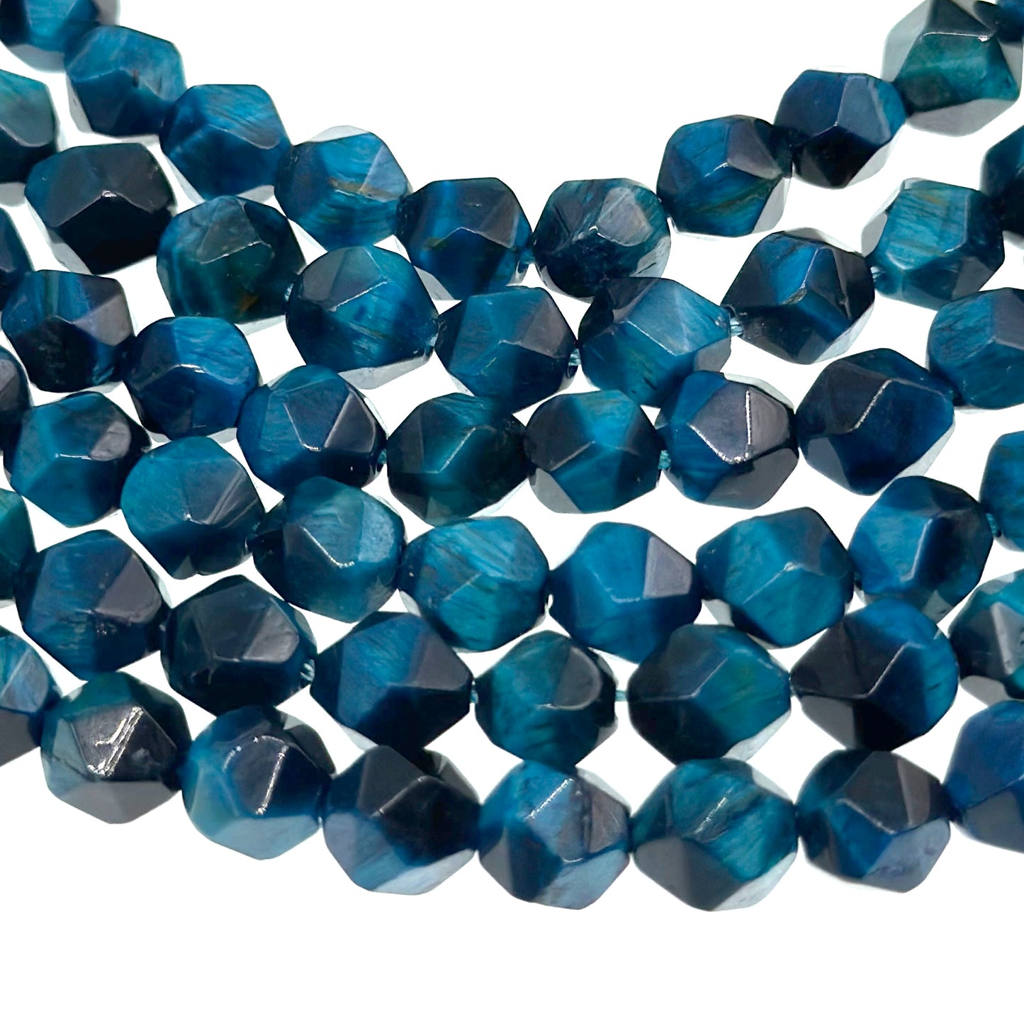 8mm cyan tiger eye beads (dyed) - star cut - faceted - 15" strand - approx. 45 beads