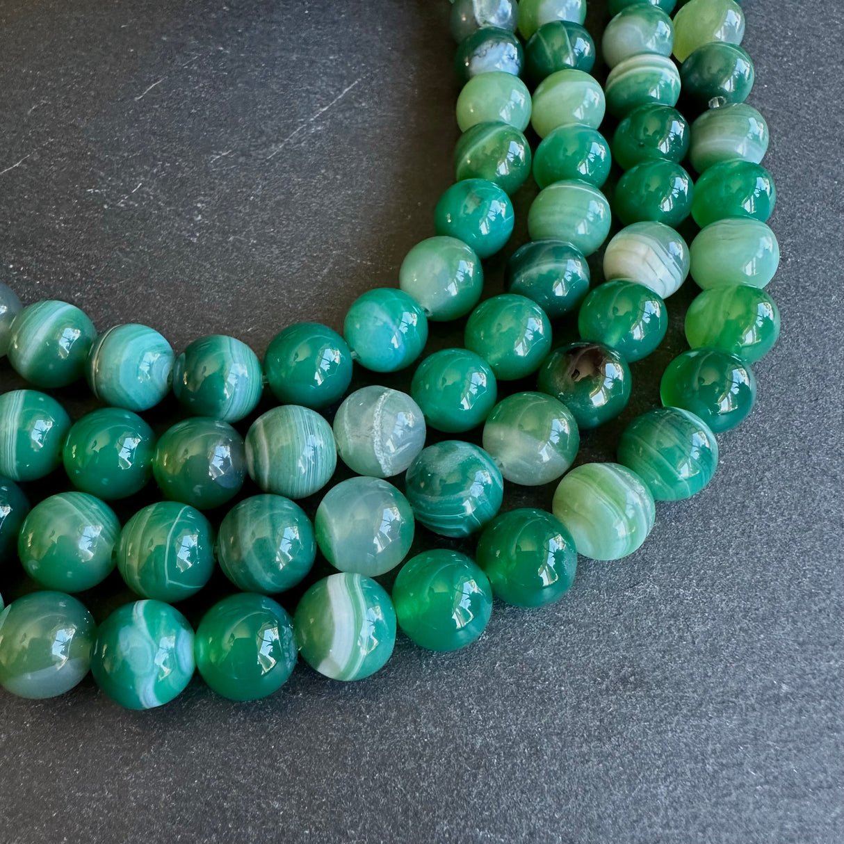 10mm seagreen striped agate beads - round - smooth - 15" strand - approx. 35 beads