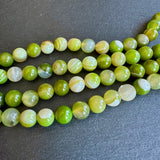 10mm lime green striped agate beads - round - smooth - 15" strand - approx. 35 beads