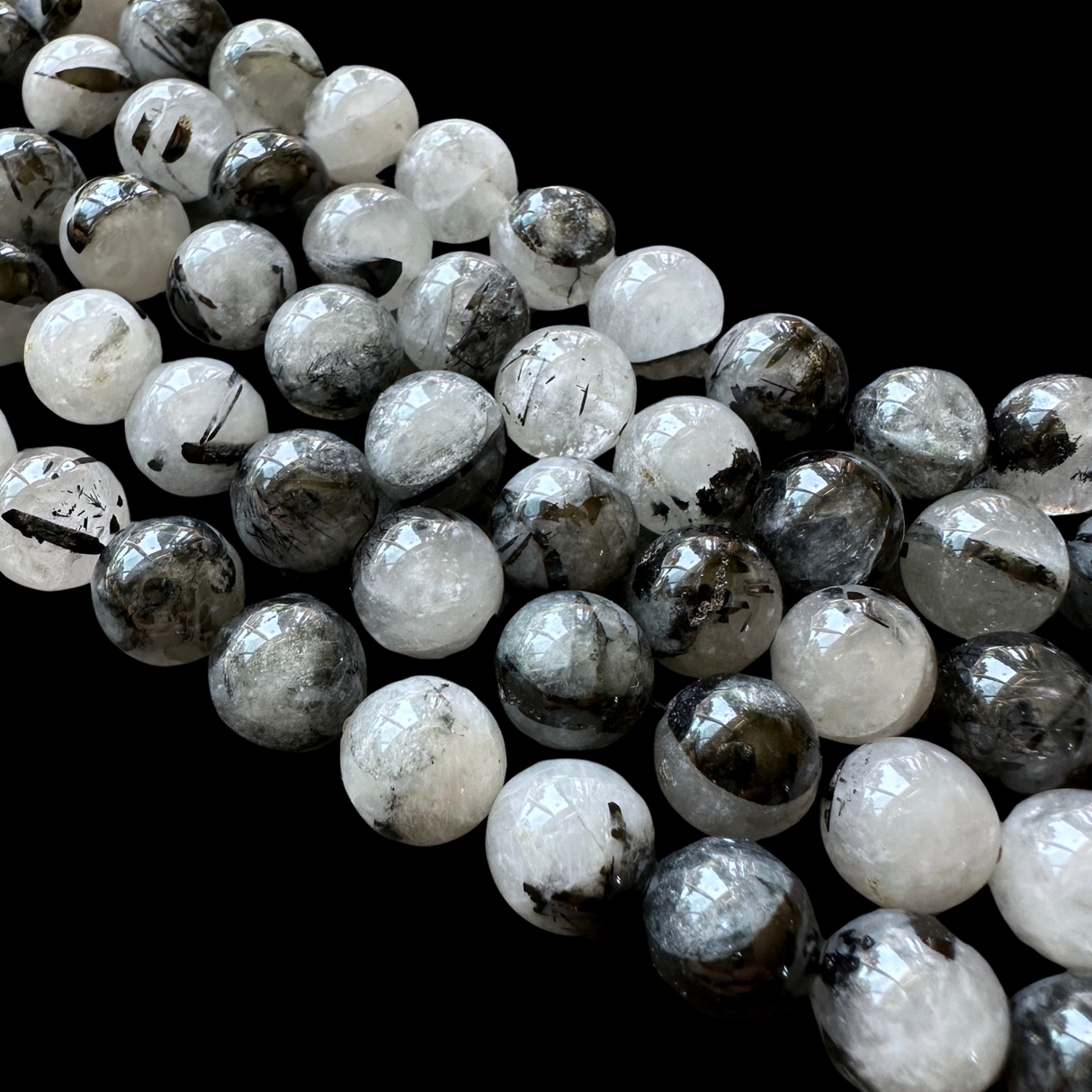 10mm black tourmalinated beads (undyed)- round - smooth - 15" strand - approx. 35 beads