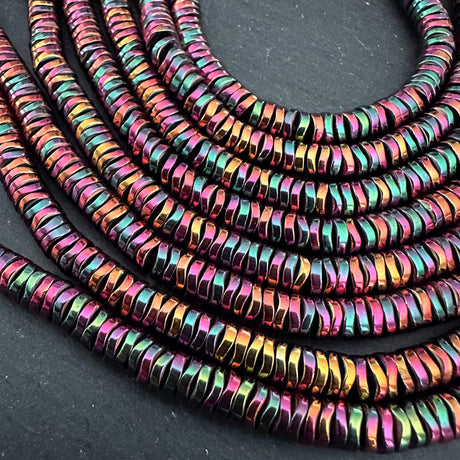 6mm rainbow electroplated hematite beads - disc - wavy - 16" strand - approx. 200 beads