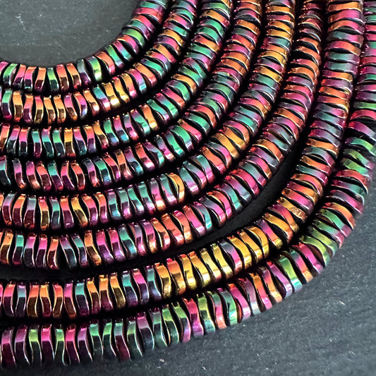 6mm rainbow electroplated hematite beads - disc - wavy - 16" strand - approx. 200 beads