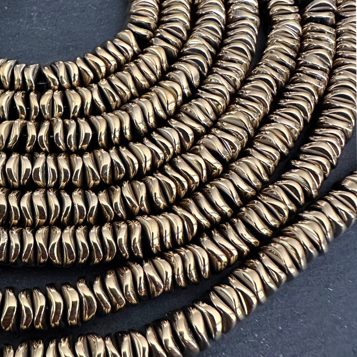 6mm gold electroplated hematite beads - disc - wavy - 16" strand - approx. 200 beads