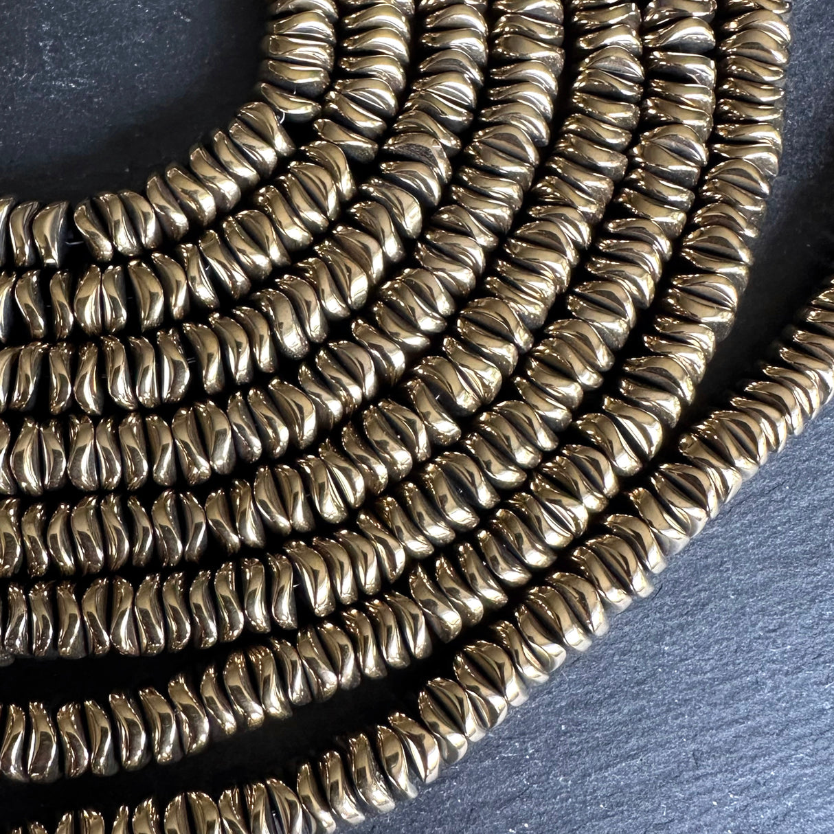 6mm gold electroplated hematite beads - disc - wavy - 16" strand - approx. 200 beads