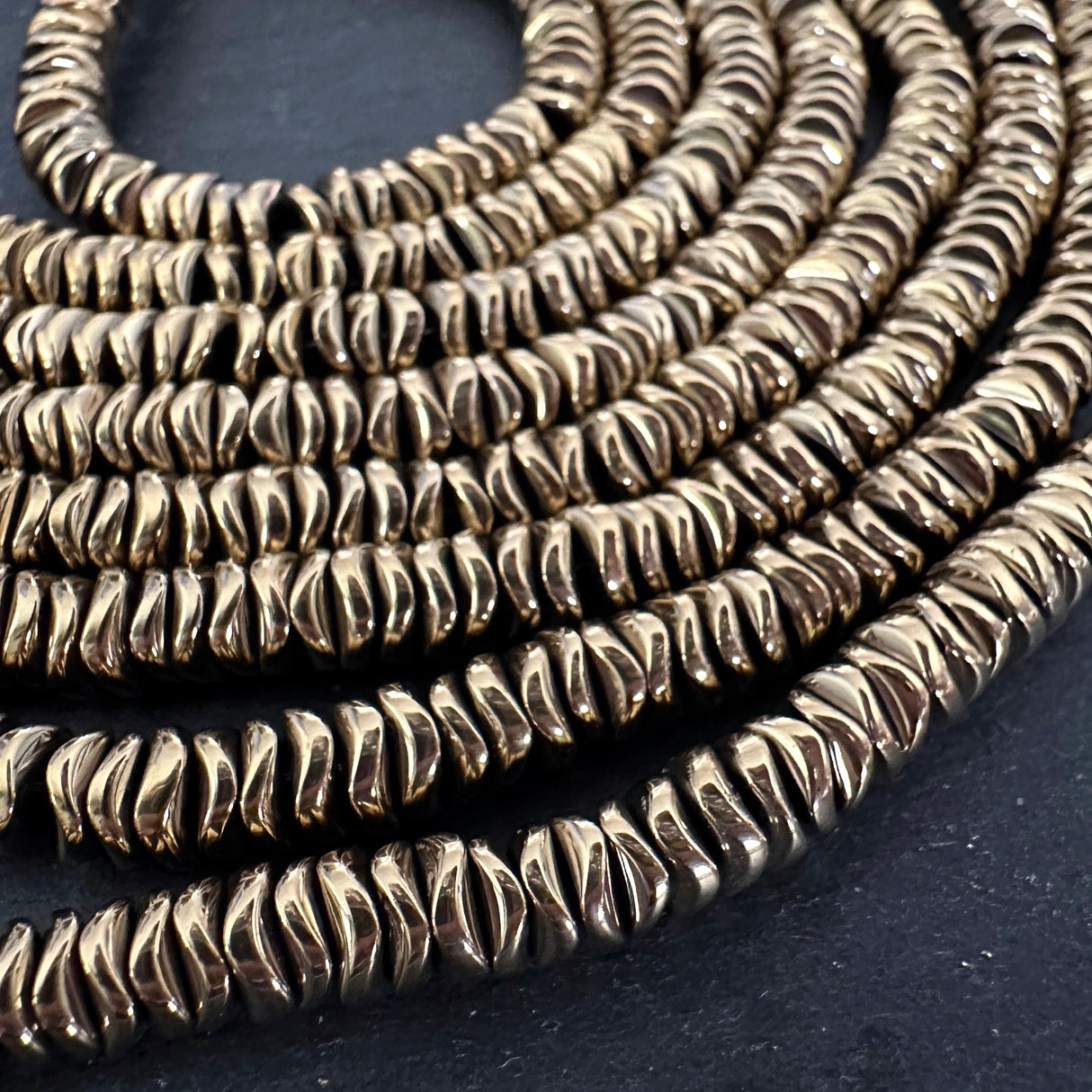 6mm gold electroplated hematite beads - disc - wavy - 16" strand - approx. 200 beads