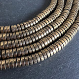 6mm light gold electroplated hematite - heishi - smooth - 15" strand - approx. 195 beads