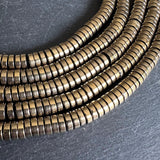 6mm light gold electroplated hematite - heishi - smooth - 15" strand - approx. 195 beads