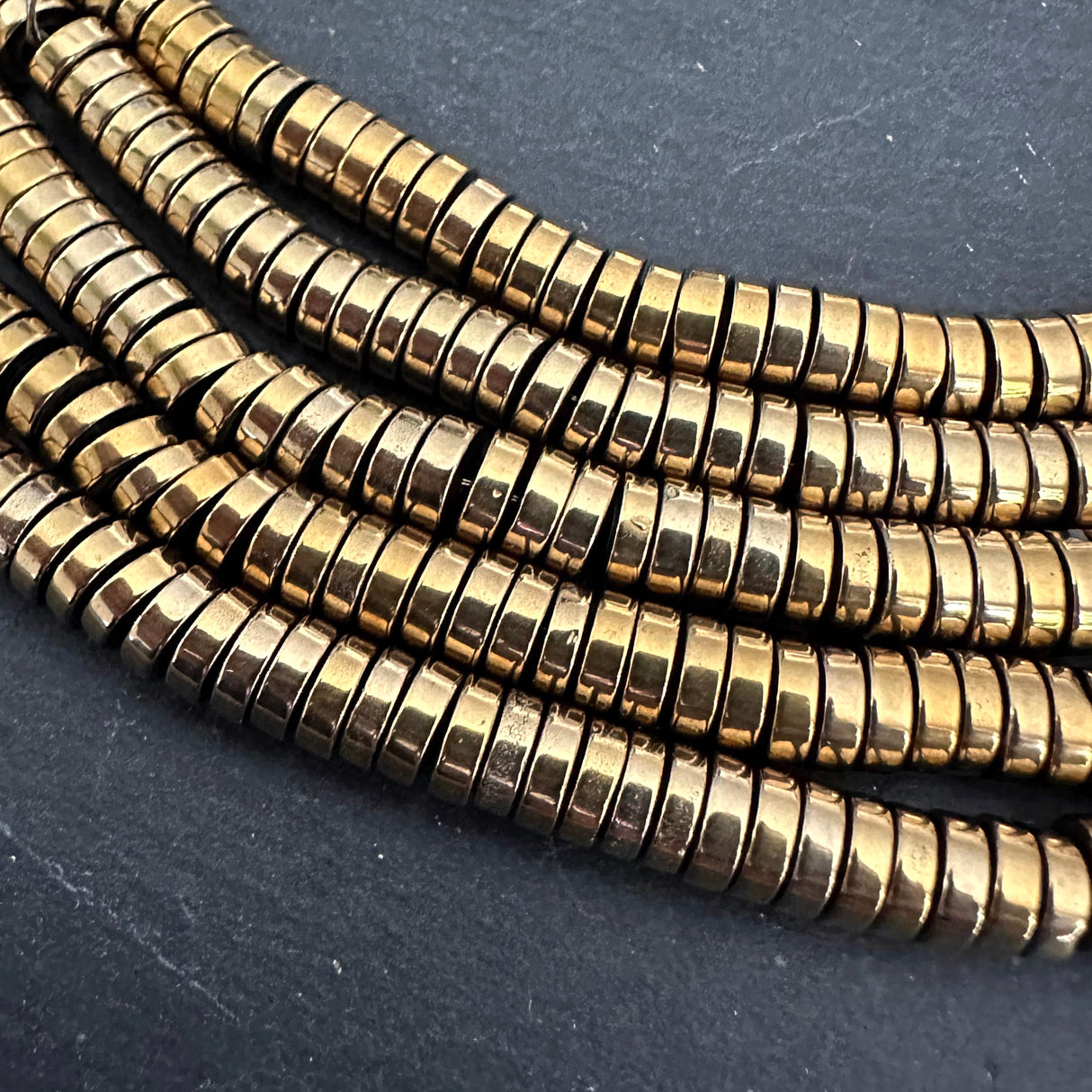 6mm gold electroplated hematite beads - heishi - smooth - 15" strand - approx. 195 beads