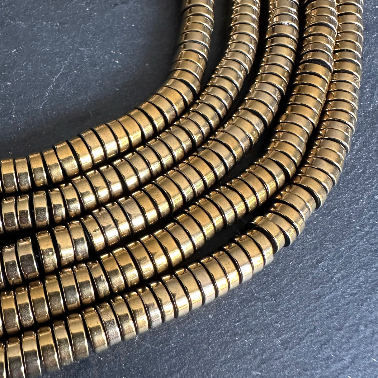 6mm gold electroplated hematite beads - heishi - smooth - 15" strand - approx. 195 beads