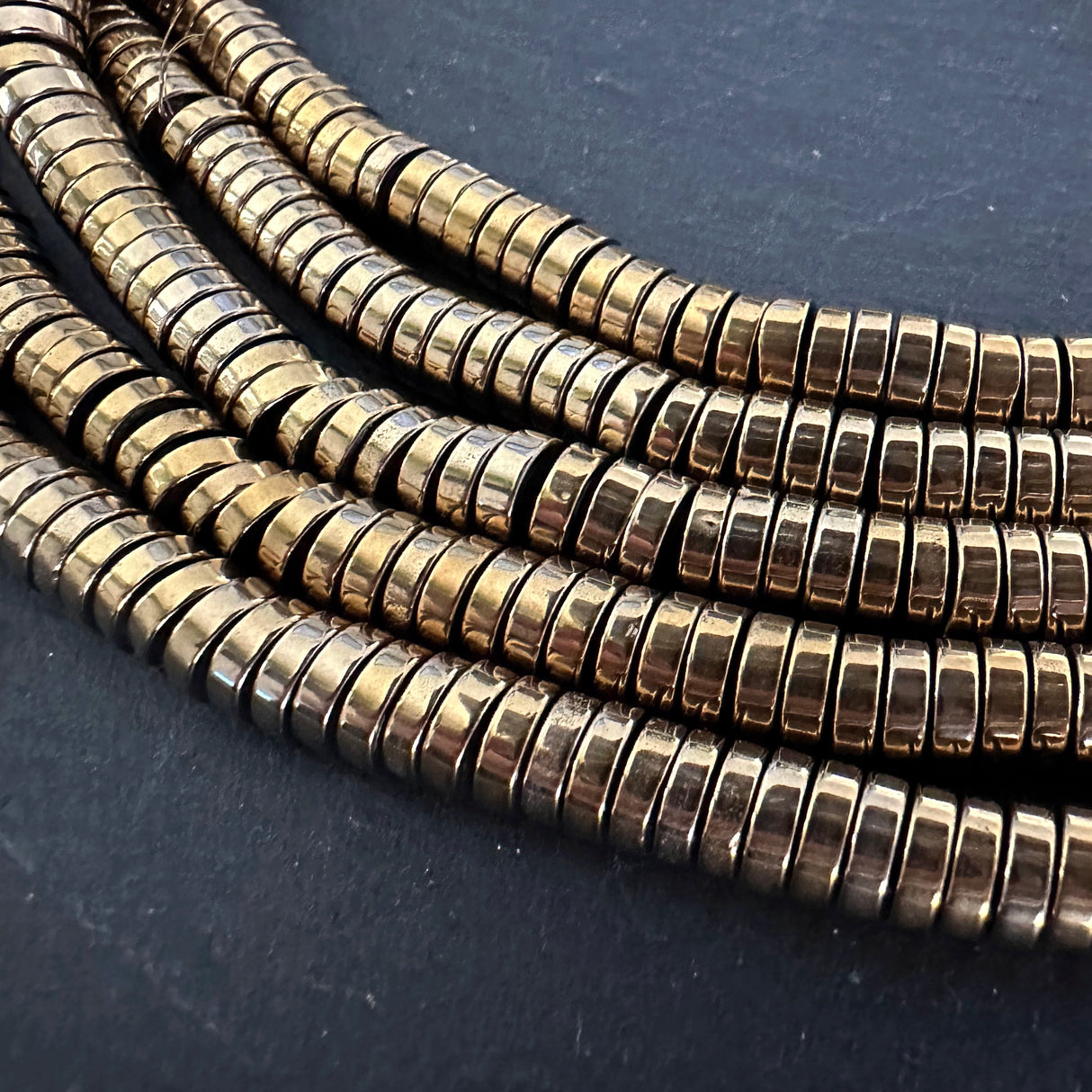 6mm gold electroplated hematite beads - heishi - smooth - 15" strand - approx. 195 beads