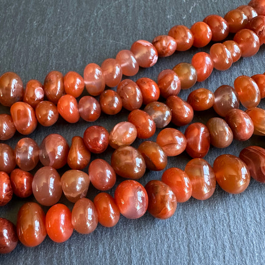 Medium red agate (dyed) nugget beads - 15" strand