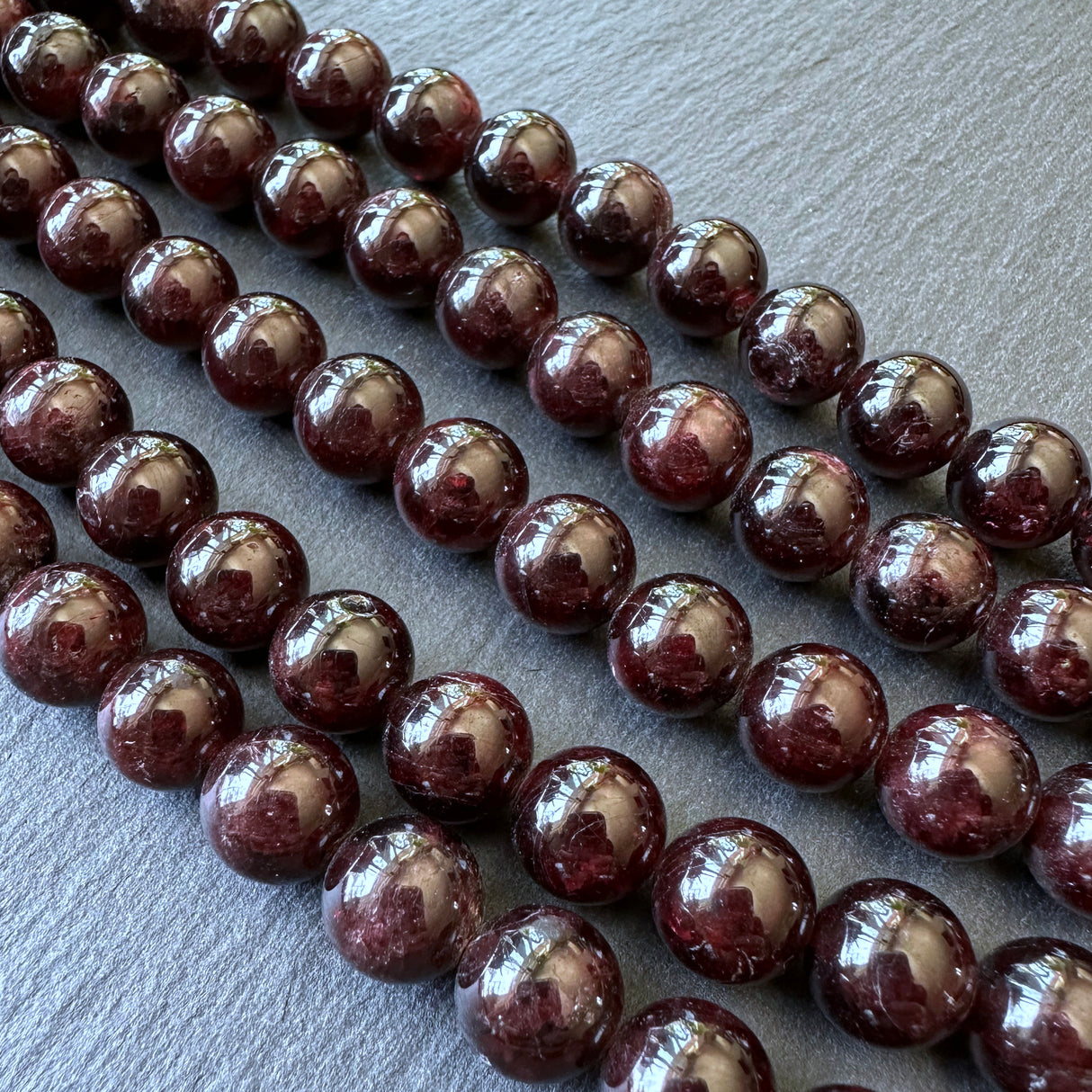 10mm garnet beads (undyed) - round - smooth - 15" strand - approx. 35 beads