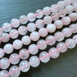 10mm rose quartz beads (undyed) - round - smooth - 15" strand - approx. 35 beads