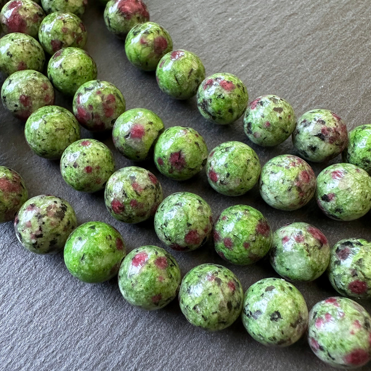 10mm ruby in zoisite beads - round - smooth - 15" strand - approx. 35 beads