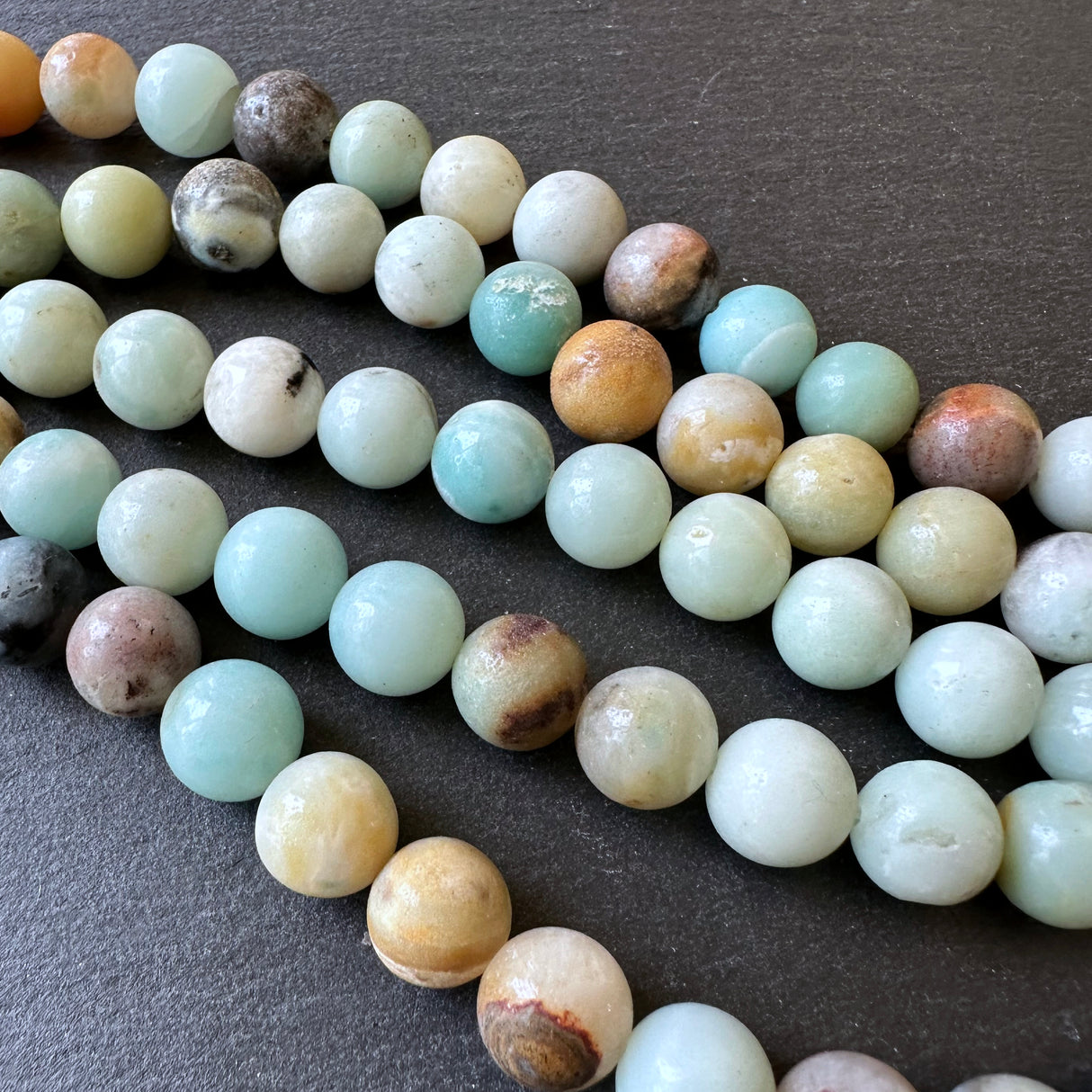 10mm amazonite beads (undyed) - round - smooth - 15" strand - approx. 35 beads