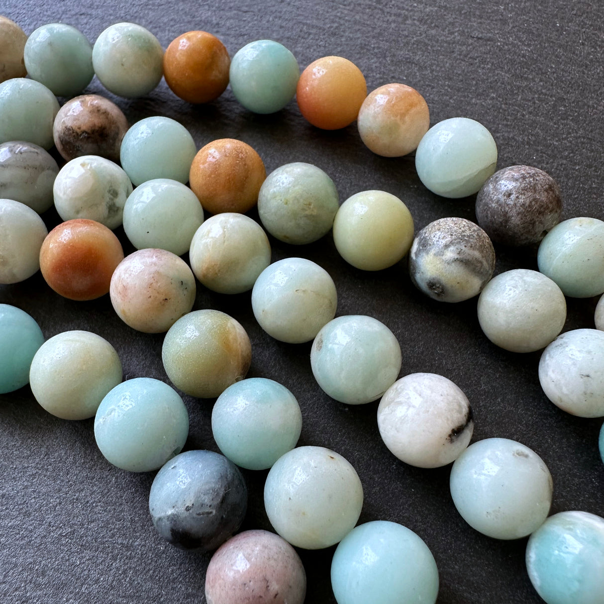 10mm amazonite beads (undyed) - round - smooth - 15" strand - approx. 35 beads