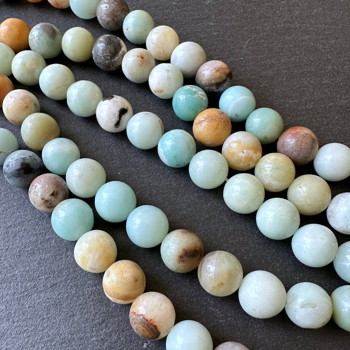 10mm amazonite beads (undyed) - round - smooth - 15" strand - approx. 35 beads