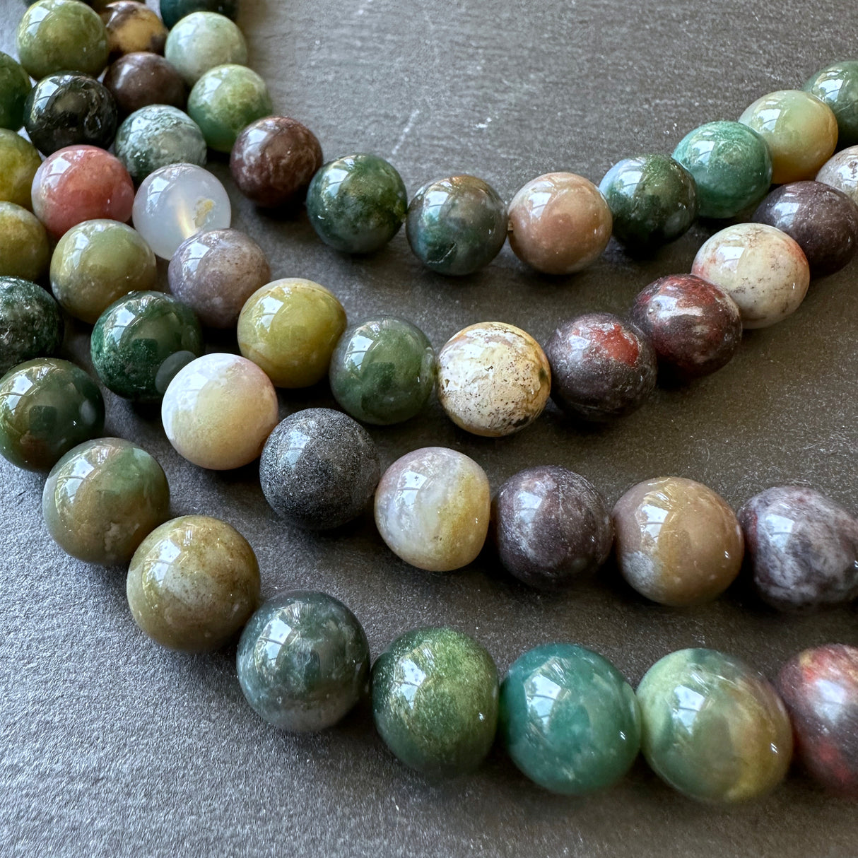 10mm indian agate beads (undyed) - round - smooth - 15" strand - approx. 35 beads