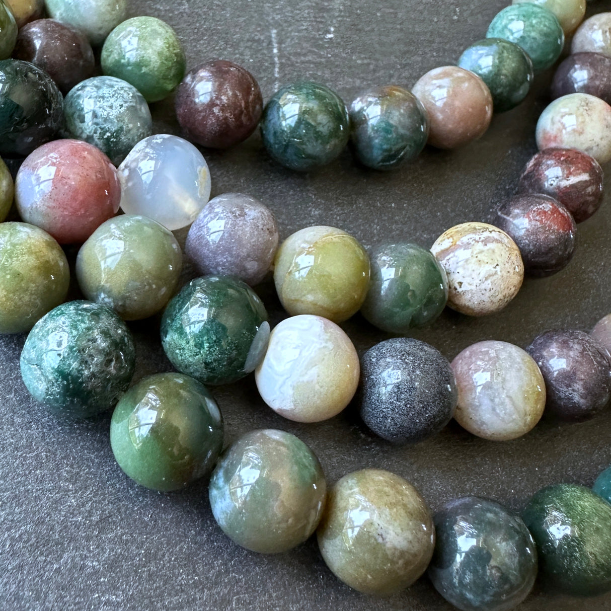 10mm indian agate beads (undyed) - round - smooth - 15" strand - approx. 35 beads