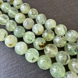 10mm prehnite beads (undyed) - round - smooth - 15" strand - approx. 35 beads