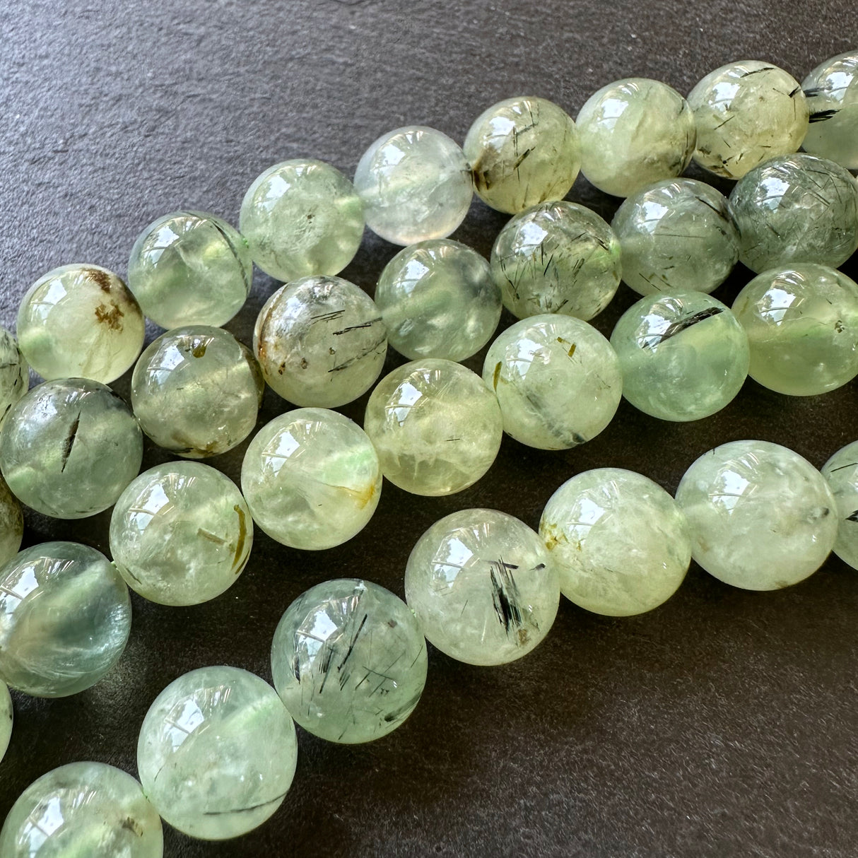 10mm prehnite beads (undyed) - round - smooth - 15" strand - approx. 35 beads