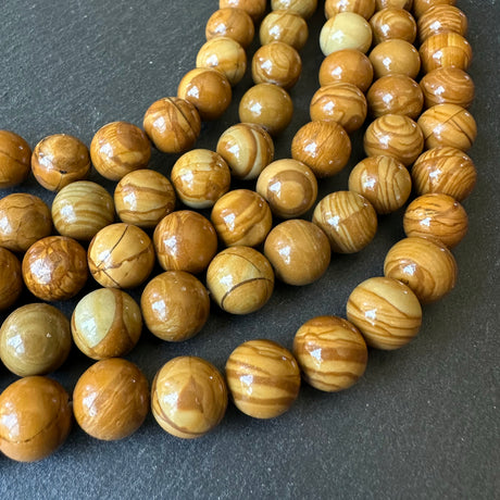 10mm wood lace jasper beads (undyed) - round - smooth - 15" strand - approx. 35 beads