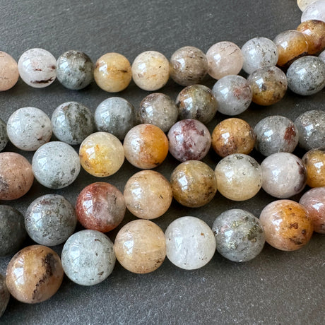 10mm lodolite beads - round - smooth - 15" strand - approx. 35 beads