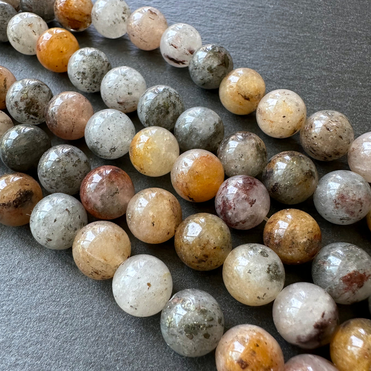 10mm lodolite beads - round - smooth - 15" strand - approx. 35 beads