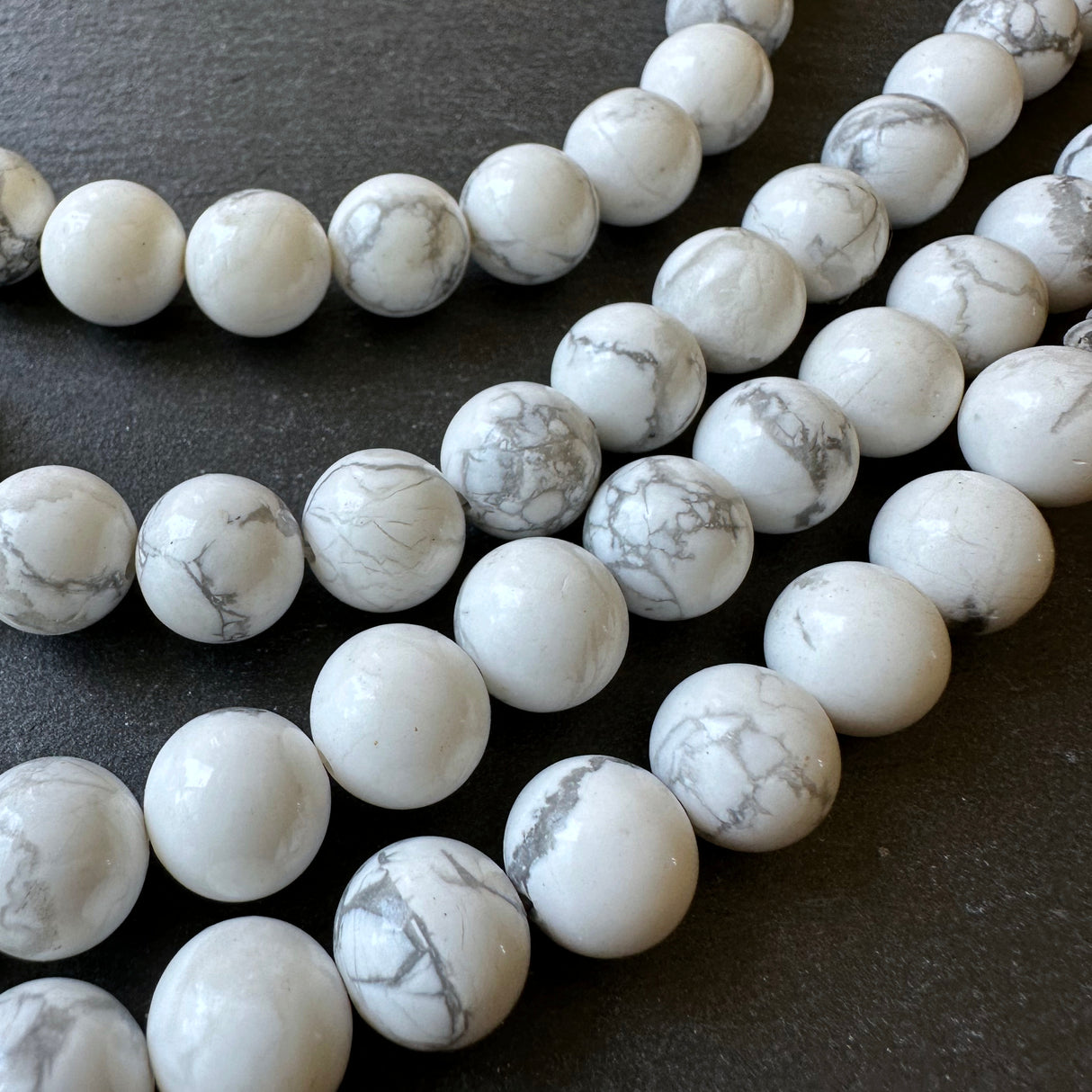 10mm white howlite beads - round - smooth - 15" strand - approx. 35 beads