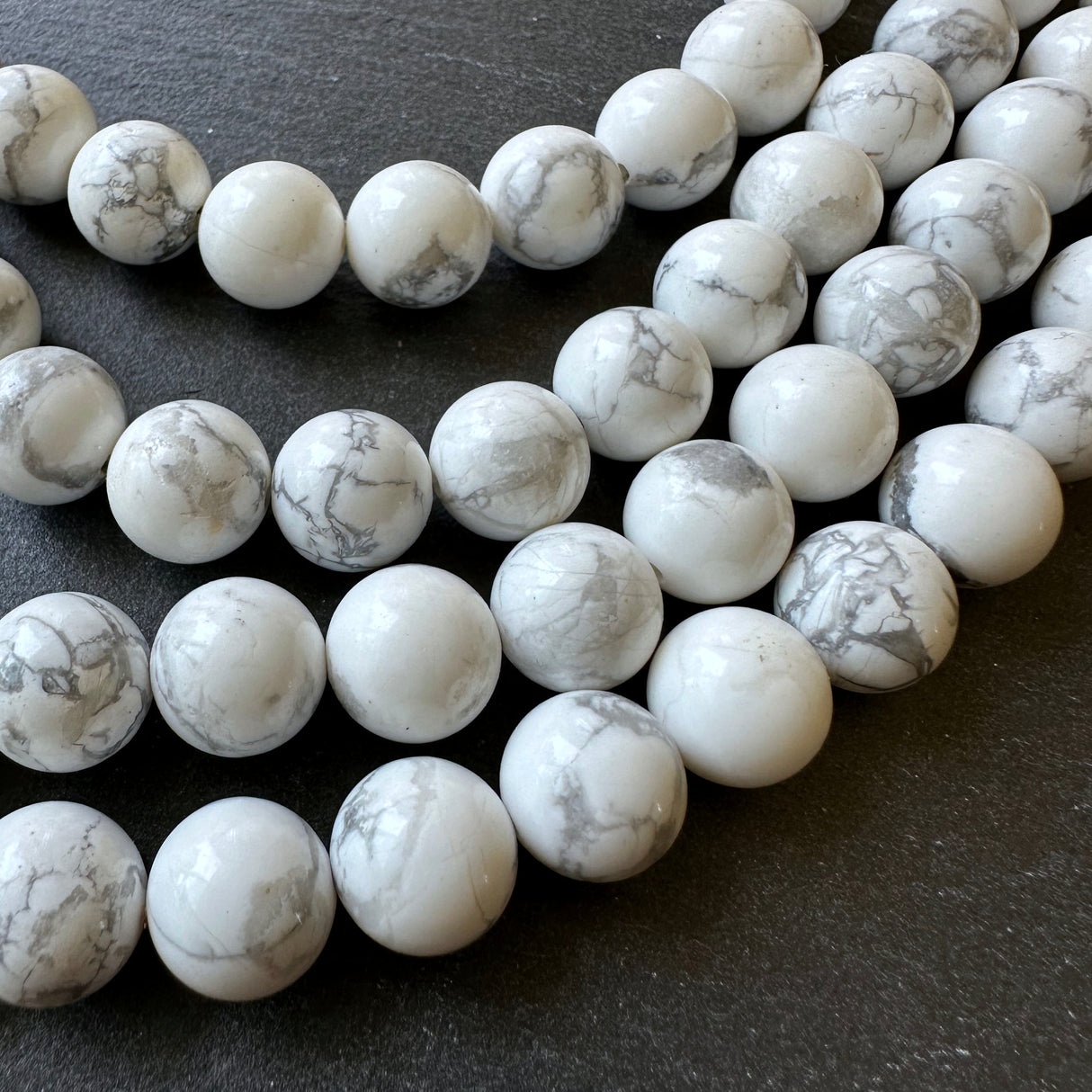 10mm white howlite beads - round - smooth - 15" strand - approx. 35 beads