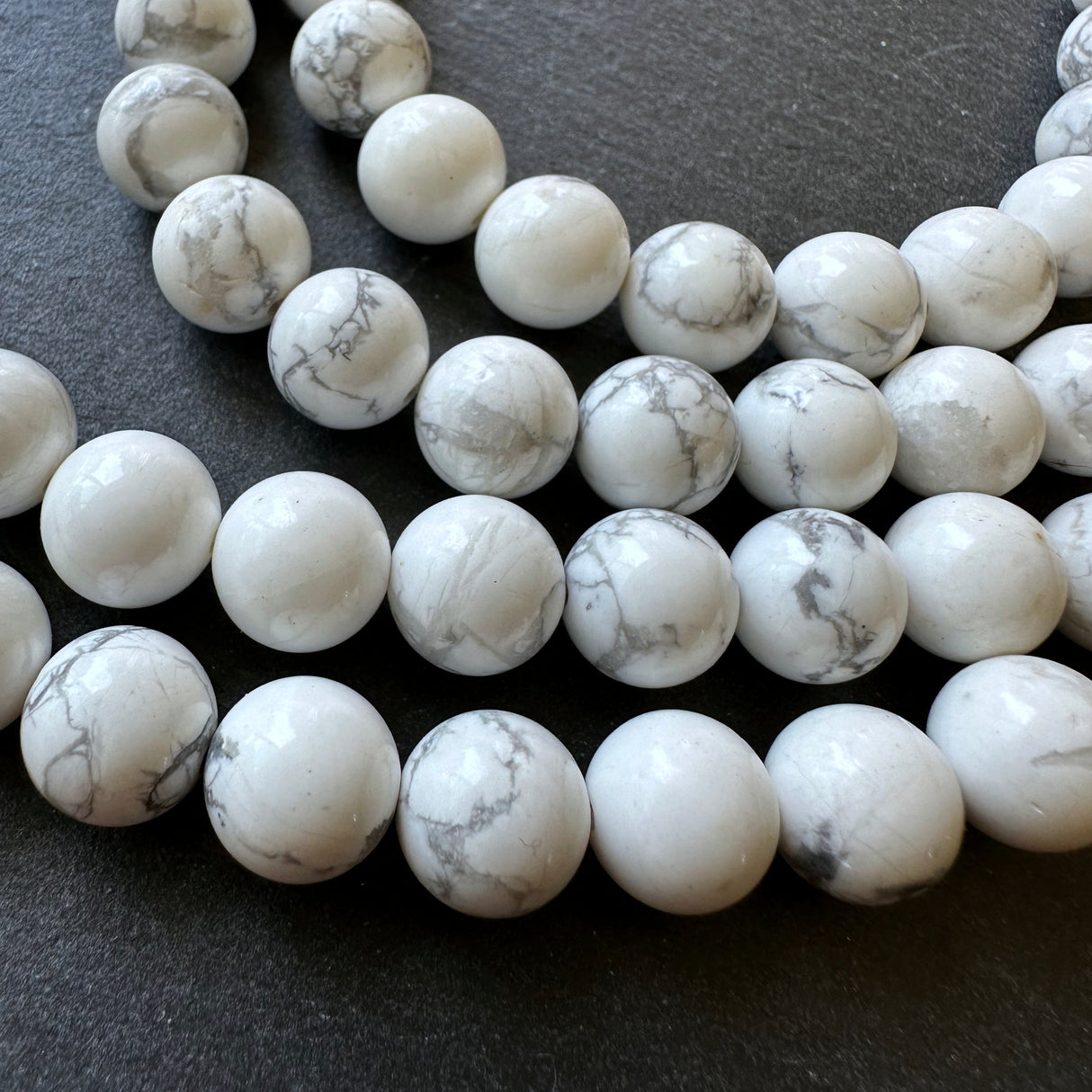 10mm white howlite beads - round - smooth - 15" strand - approx. 35 beads