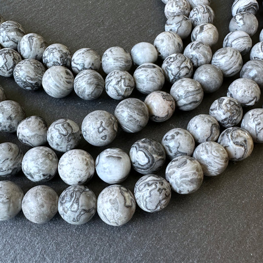 10mm netstone jasper beads (undyed)- round - smooth - 15" strand - approx. 35 beads