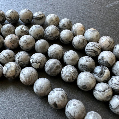10mm netstone jasper beads (undyed)- round - smooth - 15" strand - approx. 35 beads