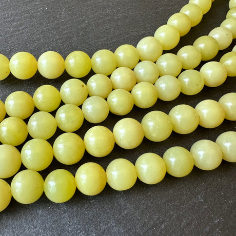 10mm lemon jade beads (undyed)- round - smooth - 15" strand - approx. 35 beads