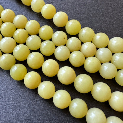 10mm lemon jade beads (undyed)- round - smooth - 15" strand - approx. 35 beads