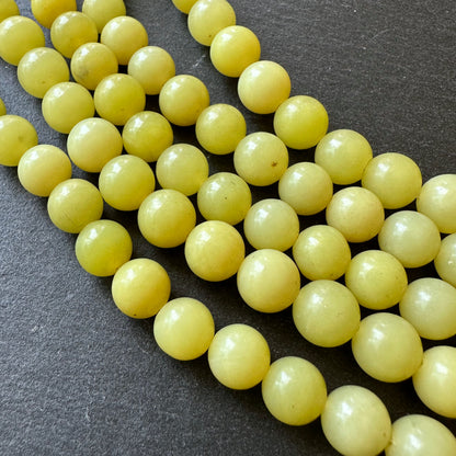10mm lemon jade beads (undyed)- round - smooth - 15" strand - approx. 35 beads