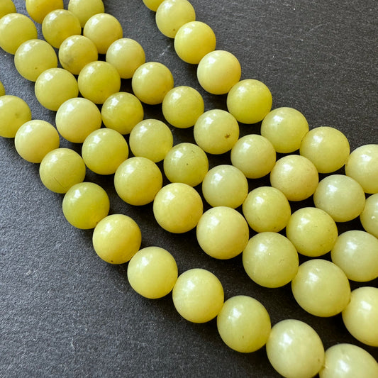 10mm lemon jade beads (undyed)- round - smooth - 15" strand - approx. 35 beads