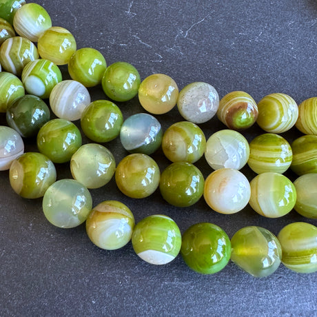 10mm lime green striped agate beads - round - smooth - 15" strand - approx. 35 beads