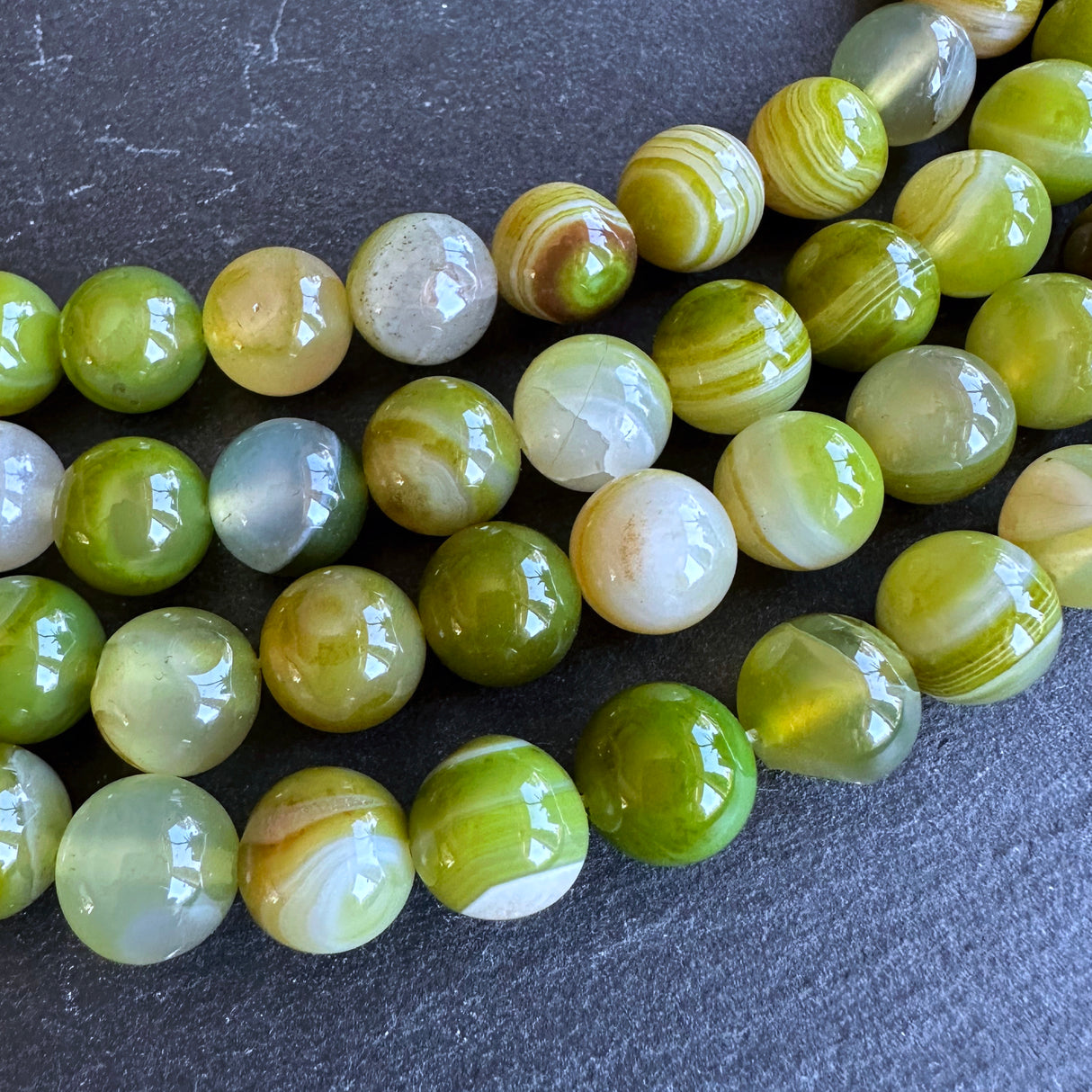 10mm lime green striped agate beads - round - smooth - 15" strand - approx. 35 beads