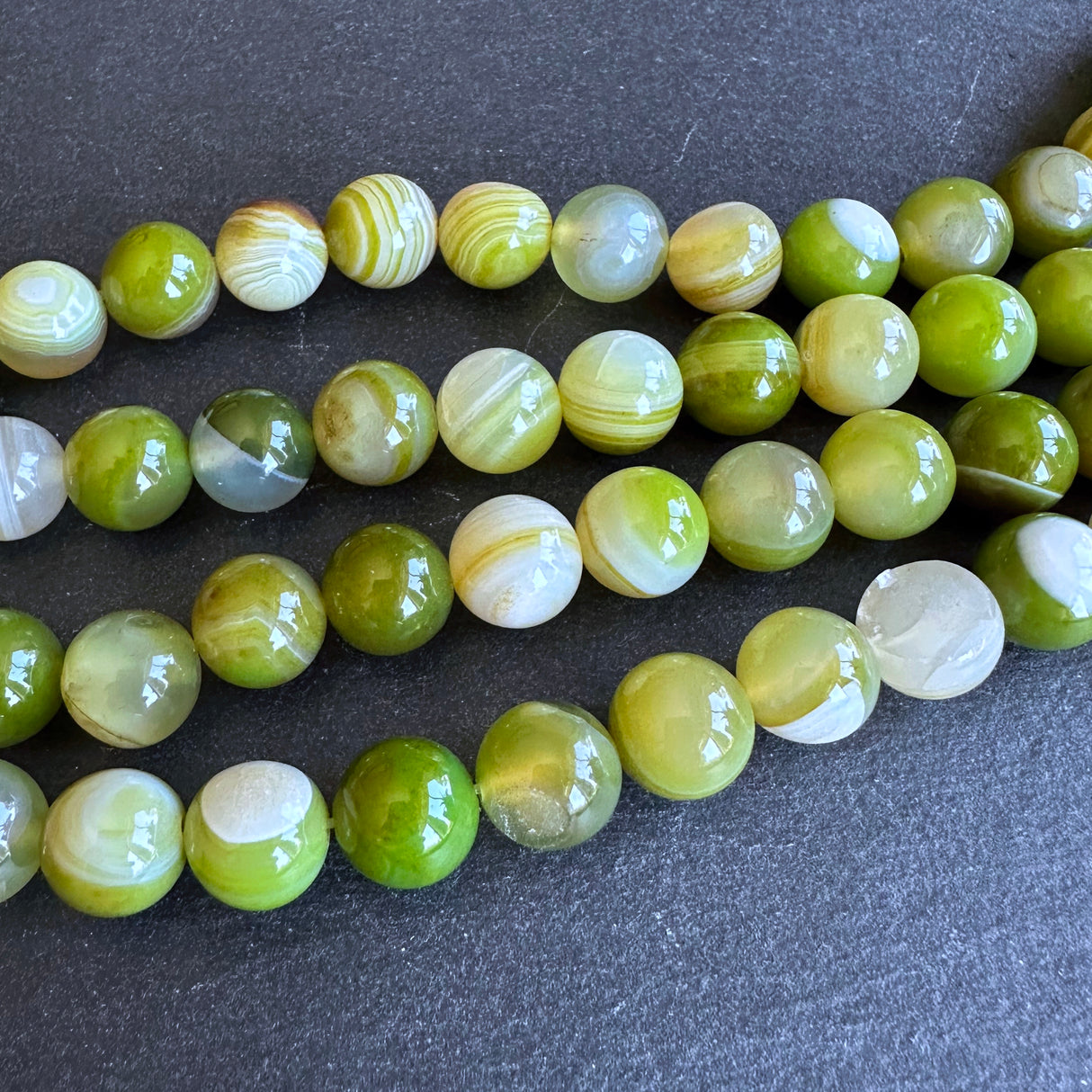 10mm lime green striped agate beads - round - smooth - 15" strand - approx. 35 beads