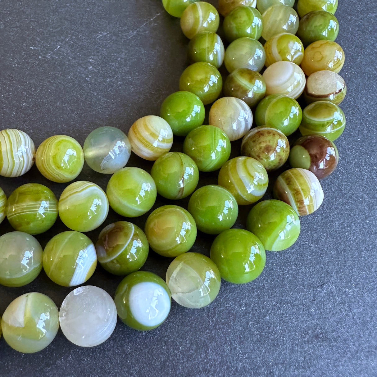 10mm lime green striped agate beads - round - smooth - 15" strand - approx. 35 beads