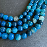 10mm blue striped agate beads - round - smooth - 15" strand - approx. 35 beads