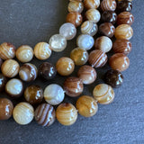 10mm dark brown striped agate beads - round - smooth - 15" strand - approx. 35 beads