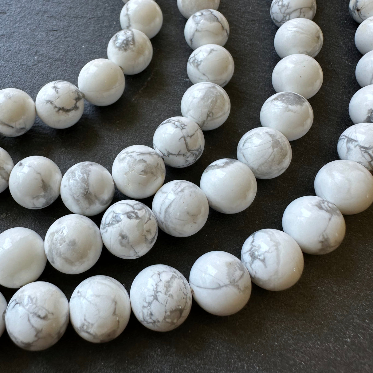 10mm white howlite beads - round - smooth - 15" strand - approx. 35 beads