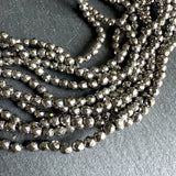 4mm silver electroplated hematite - round - faceted - 15" strand - approx. 100 beads