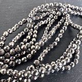 4mm silver electroplated hematite - round - faceted - 15" strand - approx. 100 beads